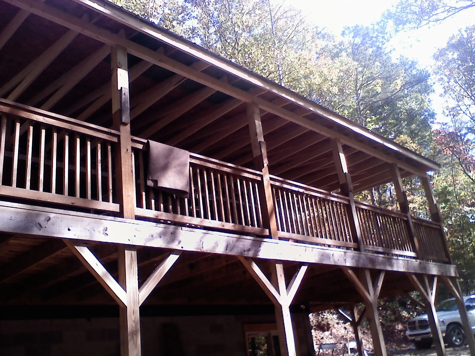 Timber framing under a new elevated porch and deck — Roof Leak Repair in Royal City by Roofing Brothers